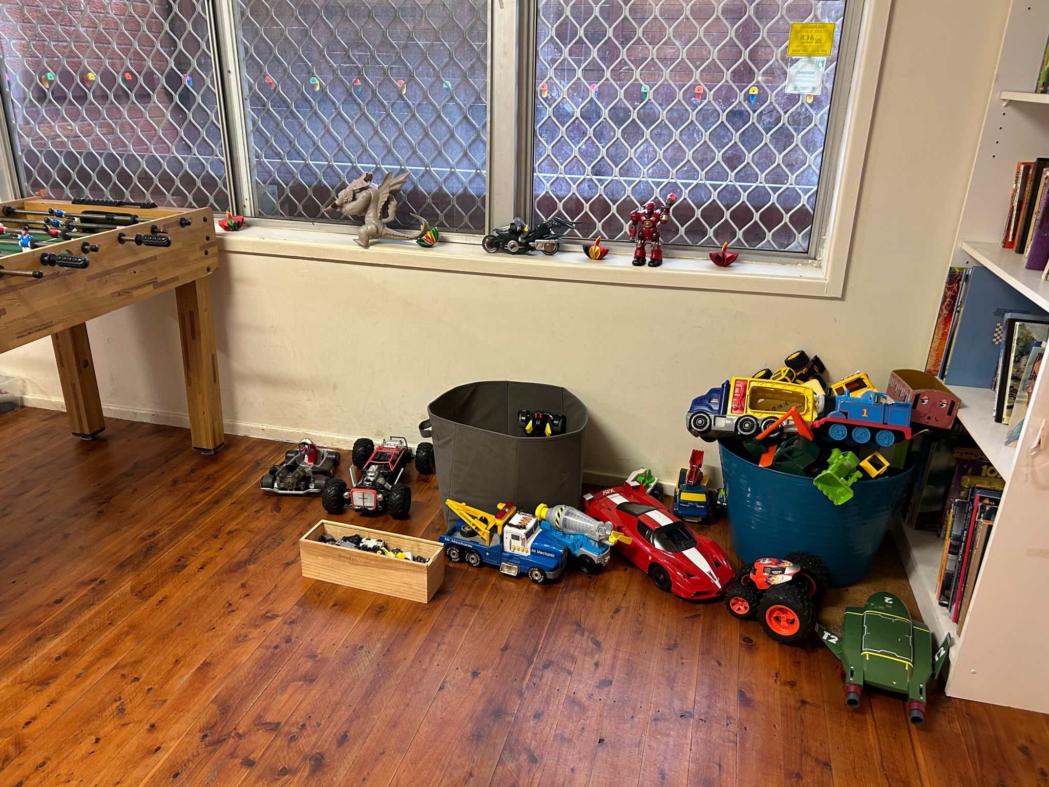 Front room showing some toys and another library