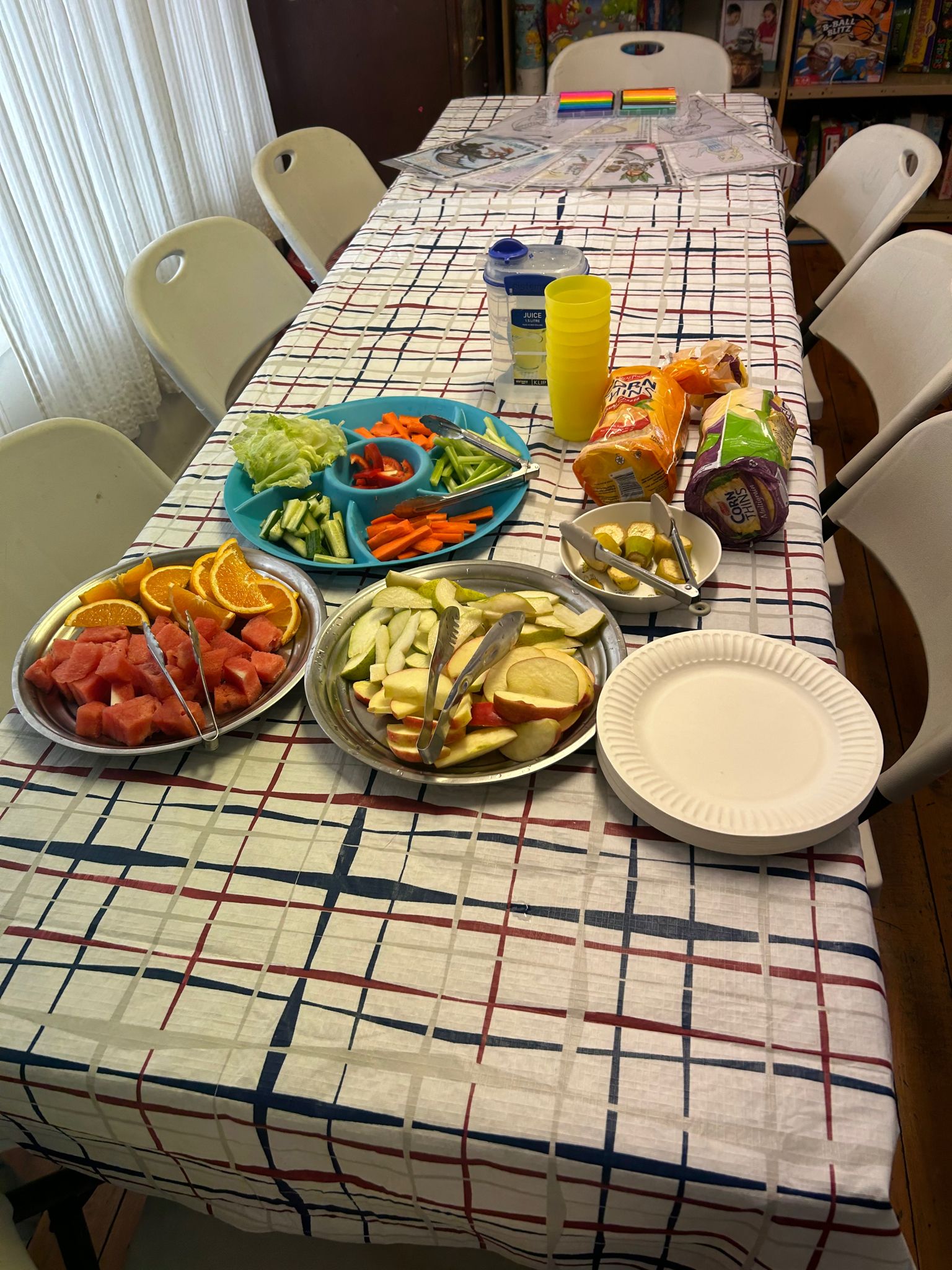 The craft room table with some snacks