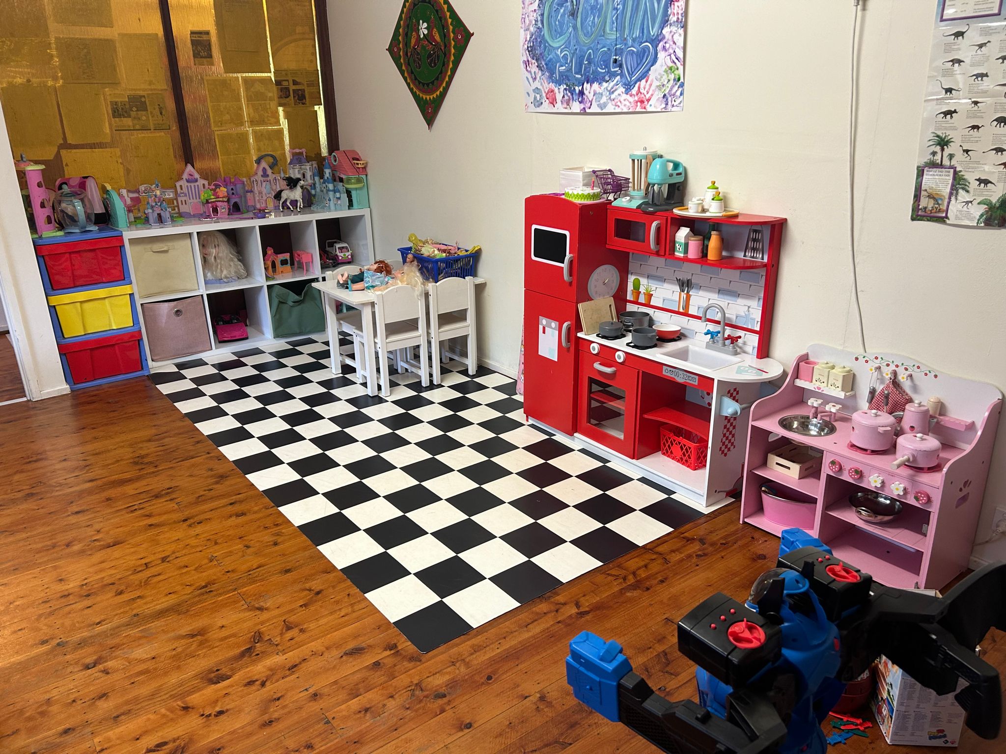 The front room showing the play kitchen and toys
